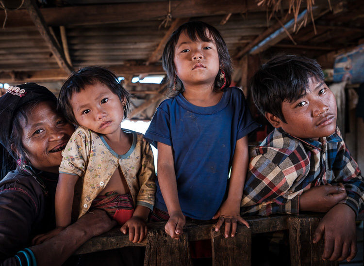 Portrait of an Enn tribe family at the Pan Ian Village