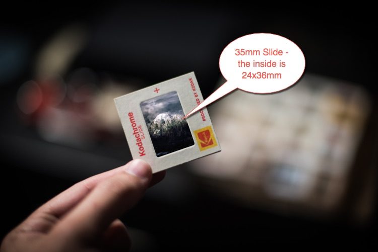 Photo of a 35mm slide and it's dimensions which are the same as a digital crop sensor