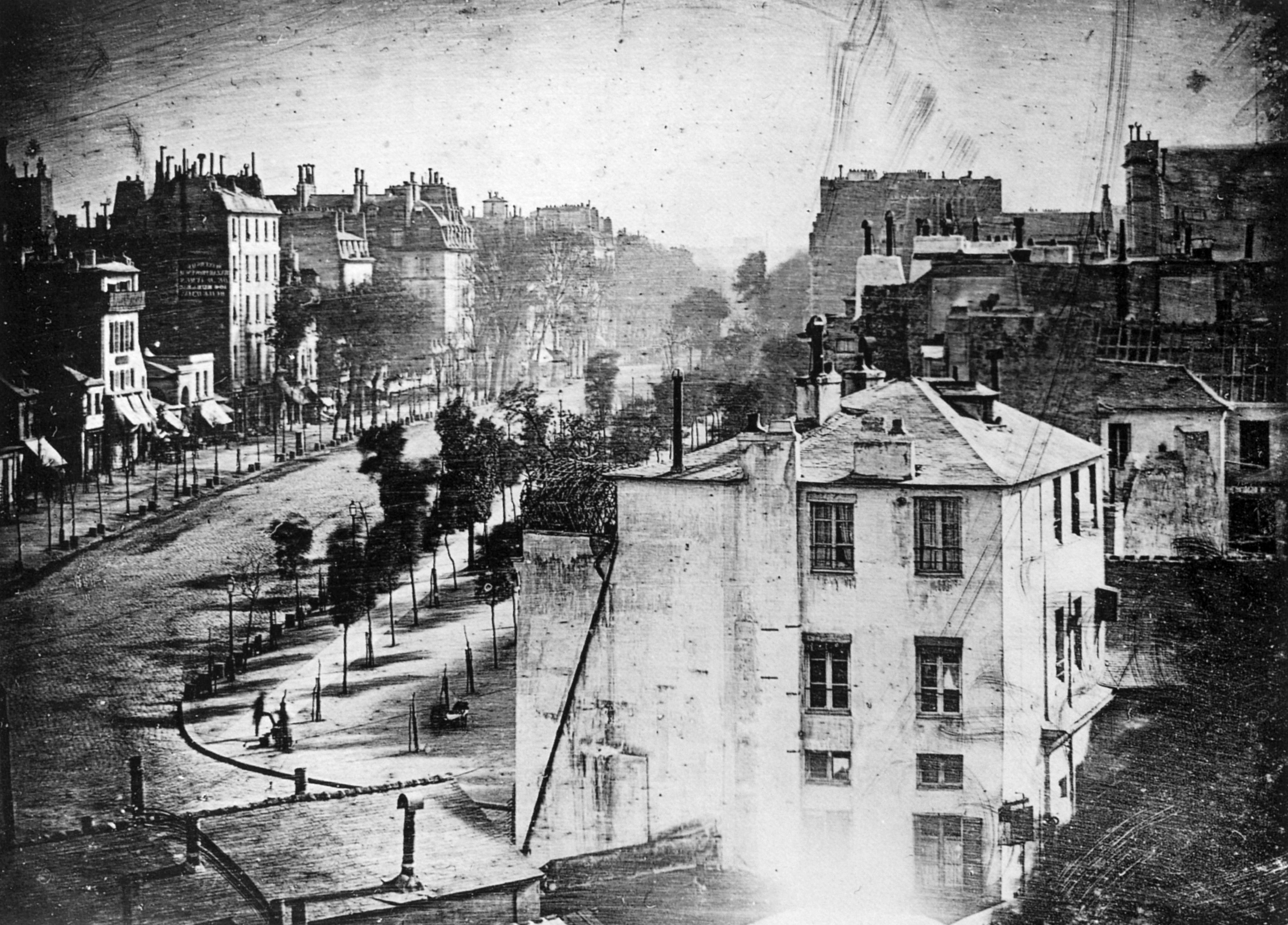 Boulevard du Temple, Paris, 1838 by Louis Daguerre, the first known photograph to include people