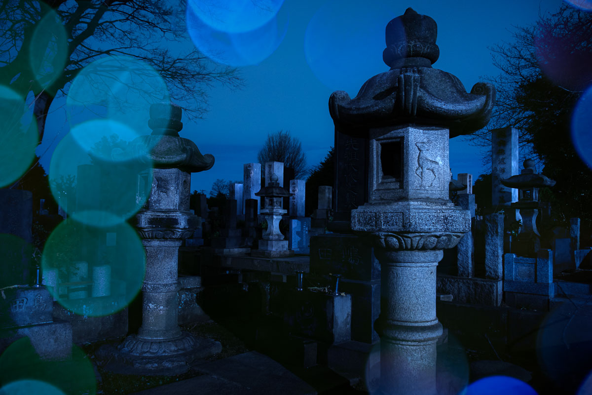 cemetery at night with bokeh overlay applied