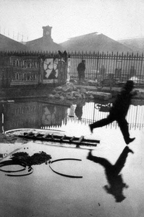 Famous photographer Cartier-Bresson's famous photo Man Jumping the Puddle taken 1930