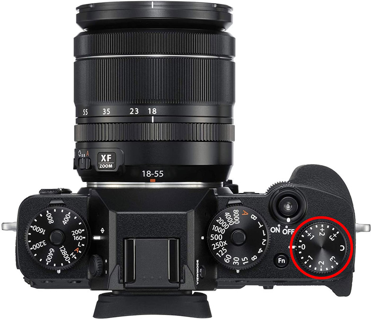 Where to find exposure compensation on a Fuji camera