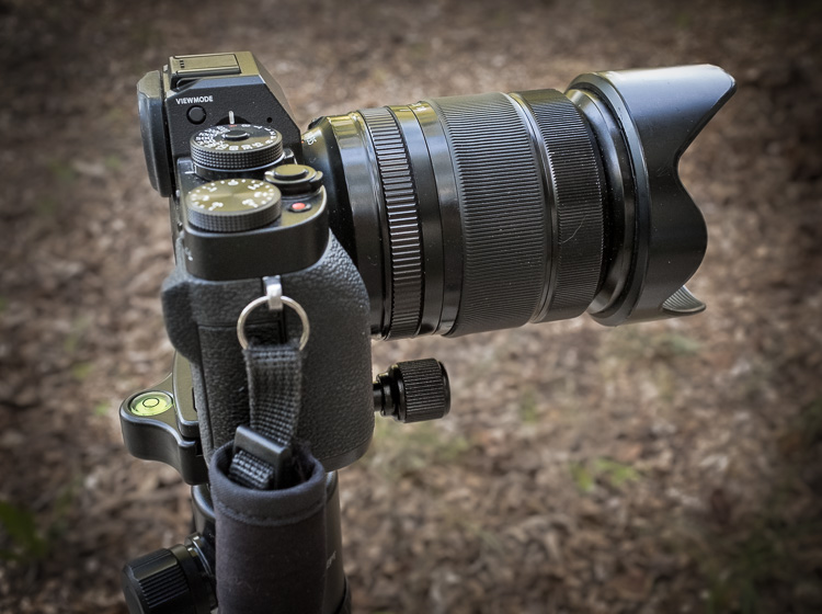 camera on a tripod is a perfect example of when to use manual mode as it allows you to take your time