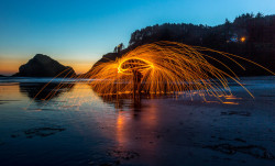 Fire spinning on the beach