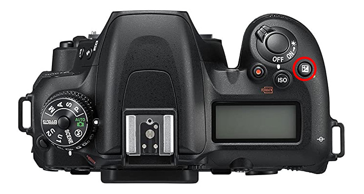 Where to find exposure compensation on a Nikon camera