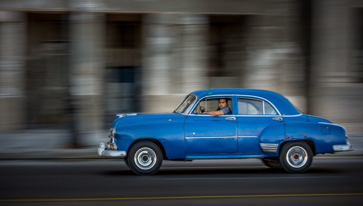 Classic car Havana Cuba with a blurred background by panning. The subject remains sharp