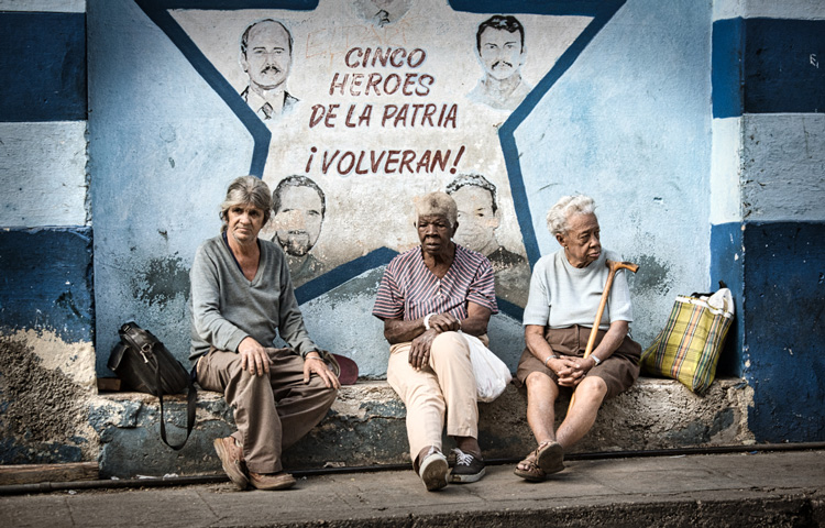 photography challenge for photo editing before photo of Havana Cuba street scene of 3 people sitting on a bench