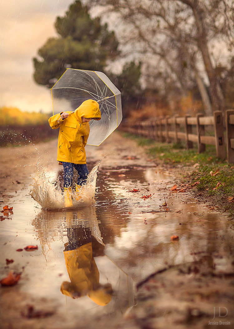 rainy day photo opportunity. Photography of your kid in a raincoat splashing in a puddle