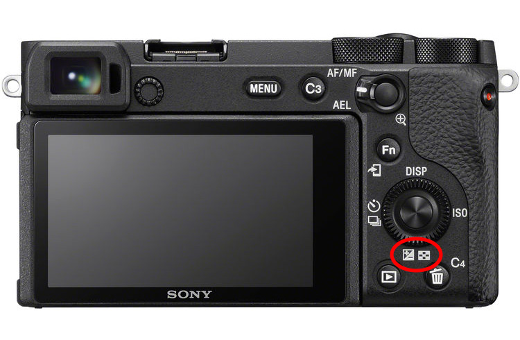 Where to find exposure compensation on a Sony camera