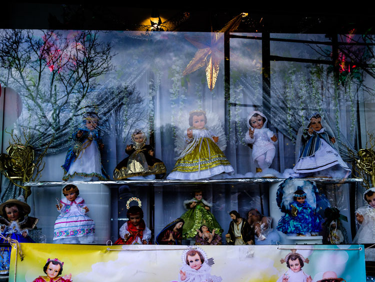 Doll display in window after clarity and contrast edits have been applied as well as a crop