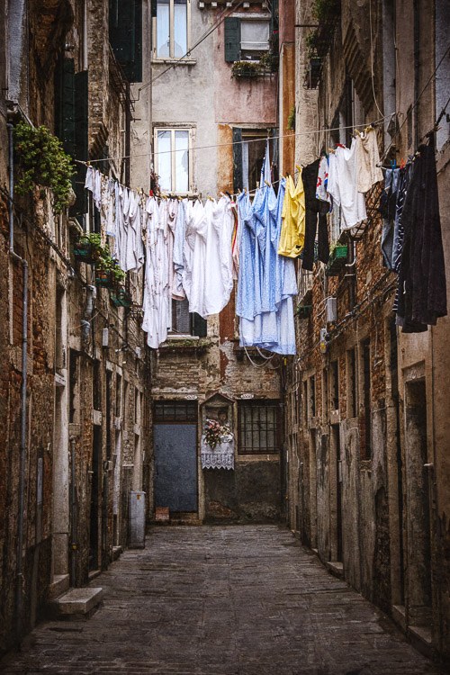 Laundry hanging between buildings in Venice