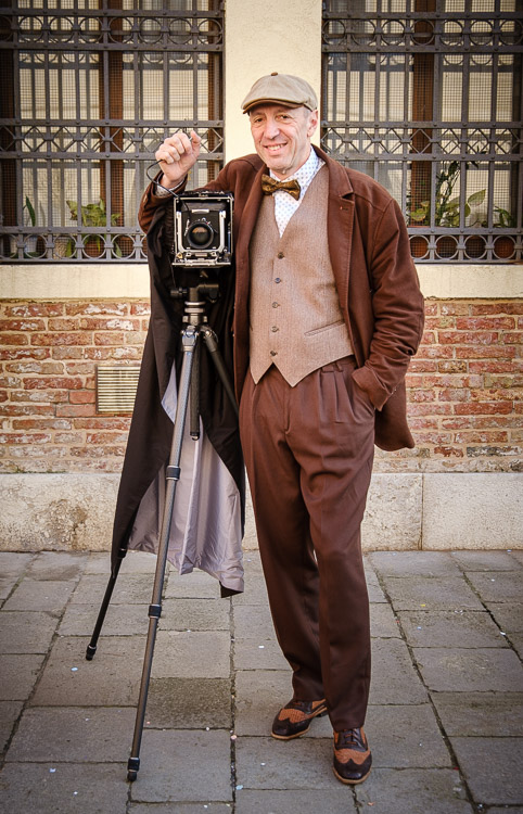 Ugo Cei photographer with antique camera