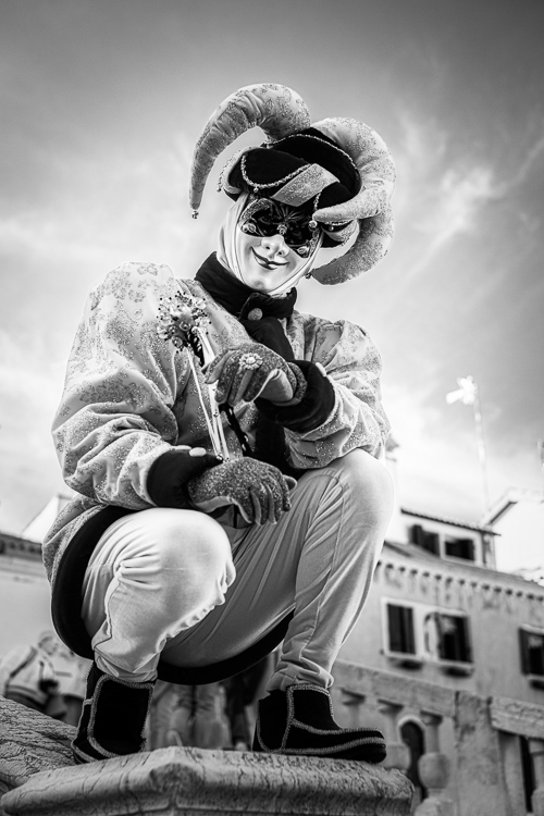 Court jester character against the sky in Infrared