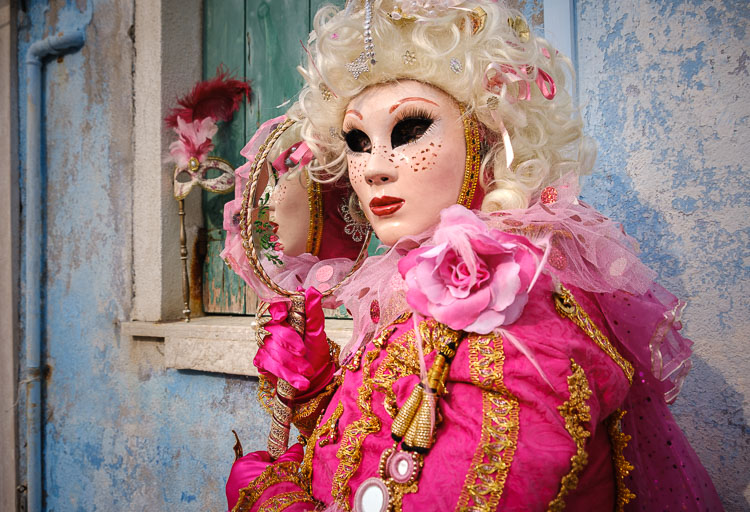 Florine Houee poses in her costume and mask