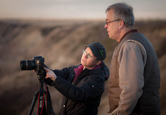 photography instructor working with a student at our southern alberta photography workshop