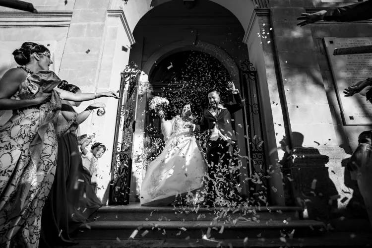 low camera angle with subjects walking towards the camera edited to bring out the black and white tones