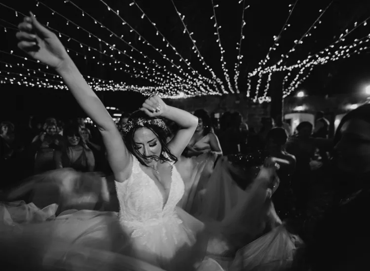 Documentary style photography with photographer in the midst of the dance floor with the subject