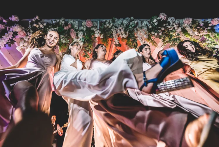 an extremely low camera angle group photo of women dancing