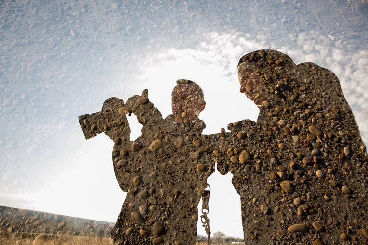 double exposure of two subjects with rocks as the image overlay