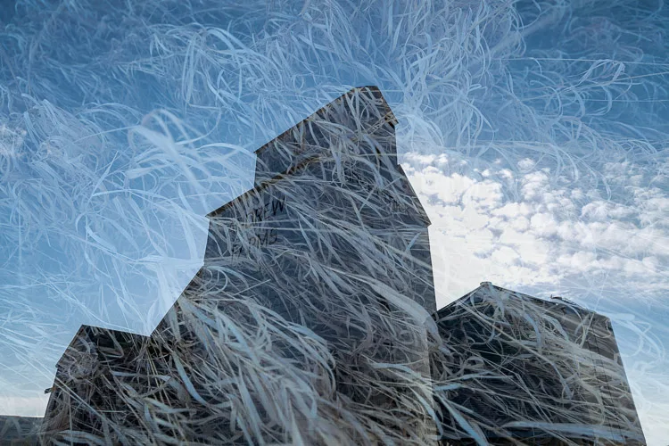 multiple exposures used to create this final image of grain elevators and wheat
